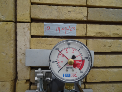 Trekproef hechting steenstrippen.